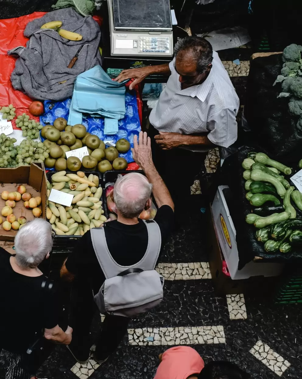 Photo by Eva Bronzini: https://www.pexels.com/photo/people-shopping-at-the-farmers-market-6165051/