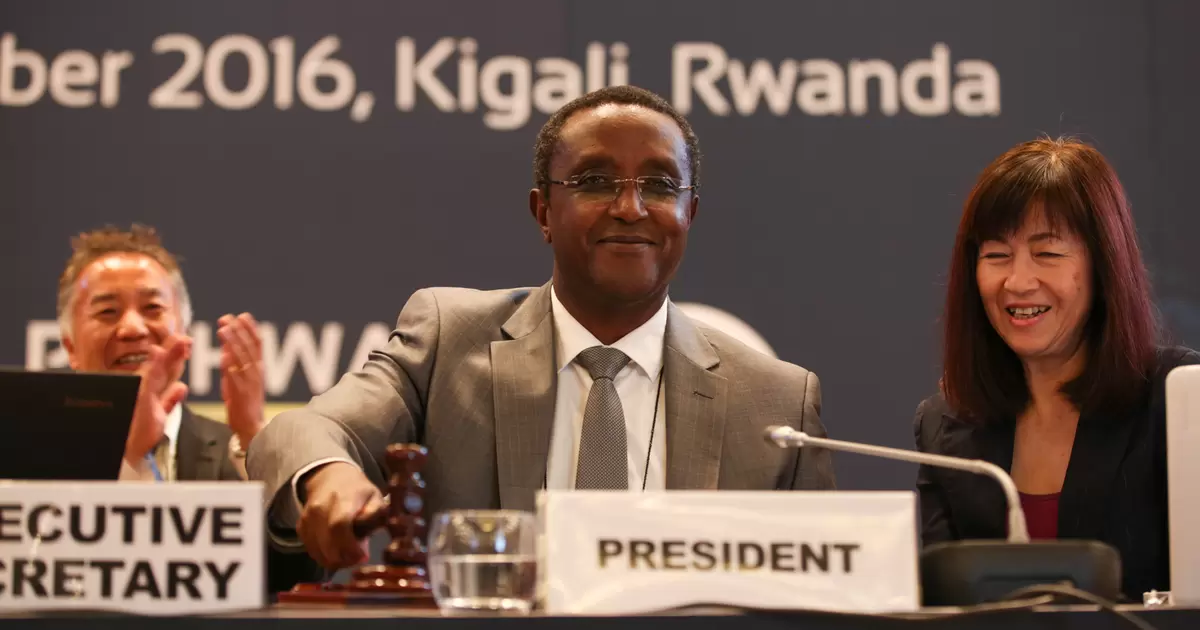 Vincent Biruta, MOP 28 President and Minister of Natural Resources for Rwanda, gavels the adoption of the Kigali Amendment to the Montreal Protocol