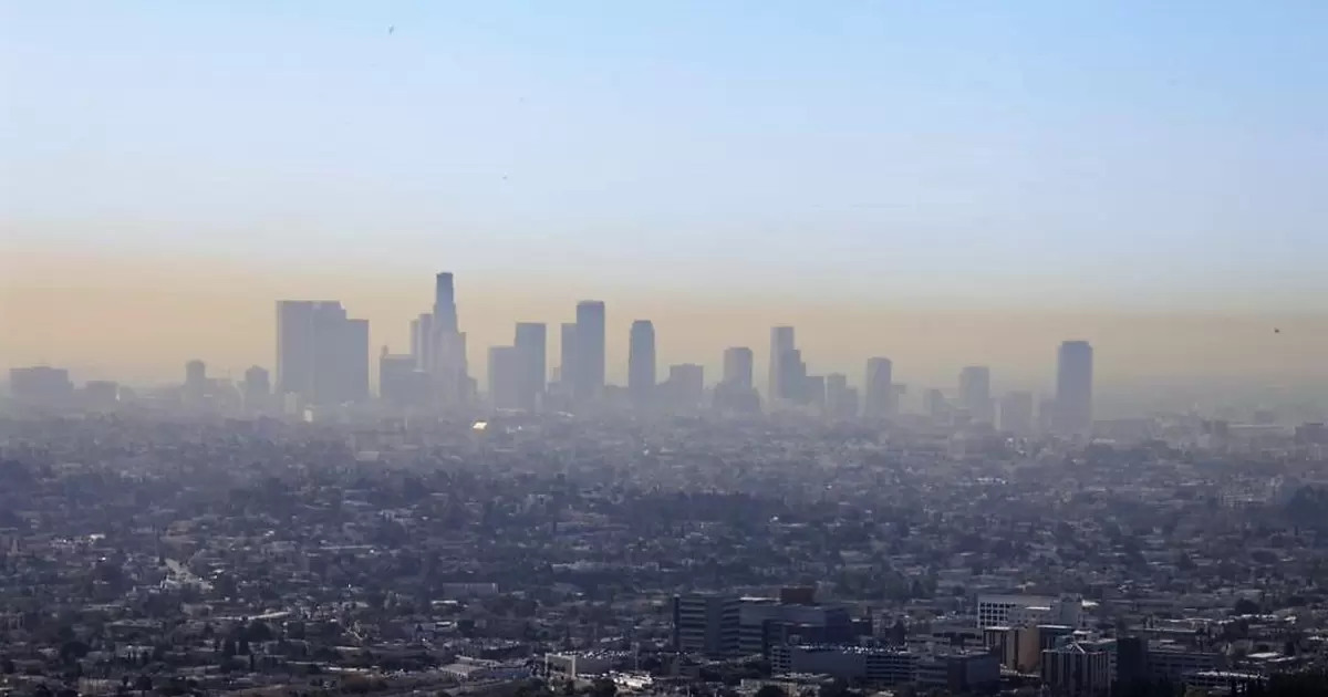 A layer of ozone, also known as smog, hangs over the City of Los Angeles. © Adobe Stock. 
