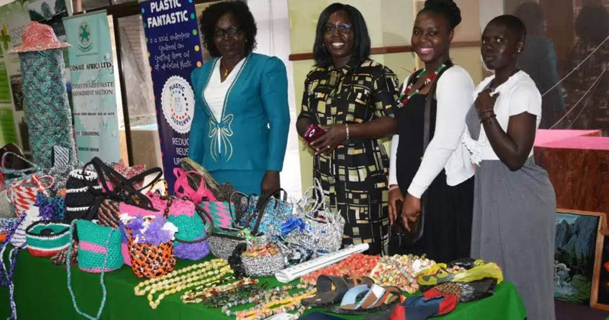 Women showcase products produced using recycled waste